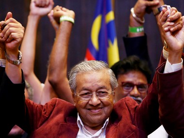 Mahathir Mohamad reacts during a news conference after general election, in Petaling Jaya